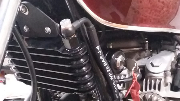 A customer with a 1974 Honda Dream CB400 vintage motorcycle wanted to increase the cooling power of his motorcycle's engine oil by making a modification and applying an additional radiator.